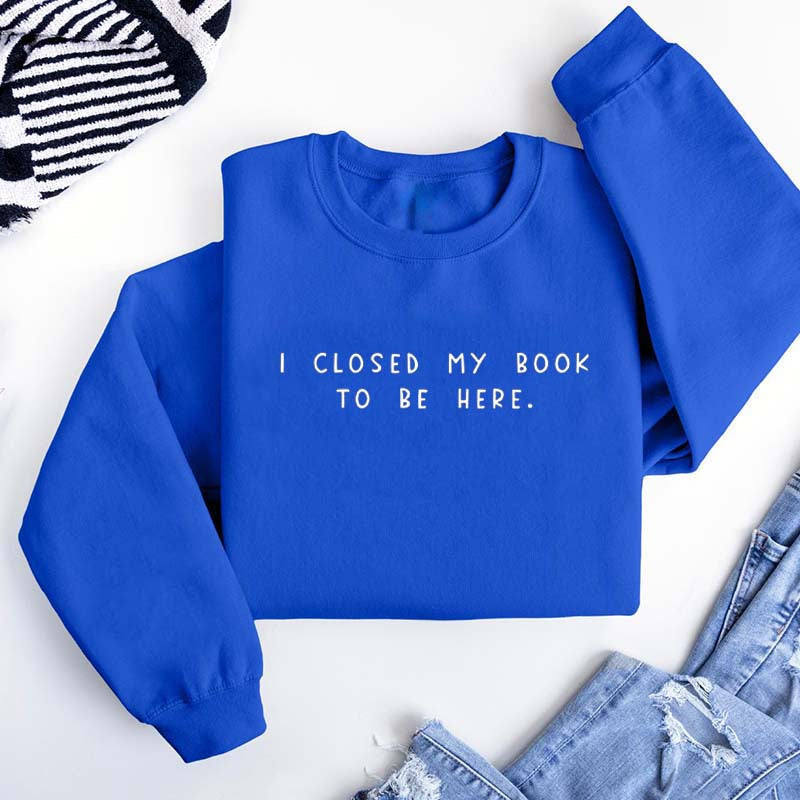 Sweat-shirt pour rat de bibliothèque « Je ferme mon livre pour être ici »